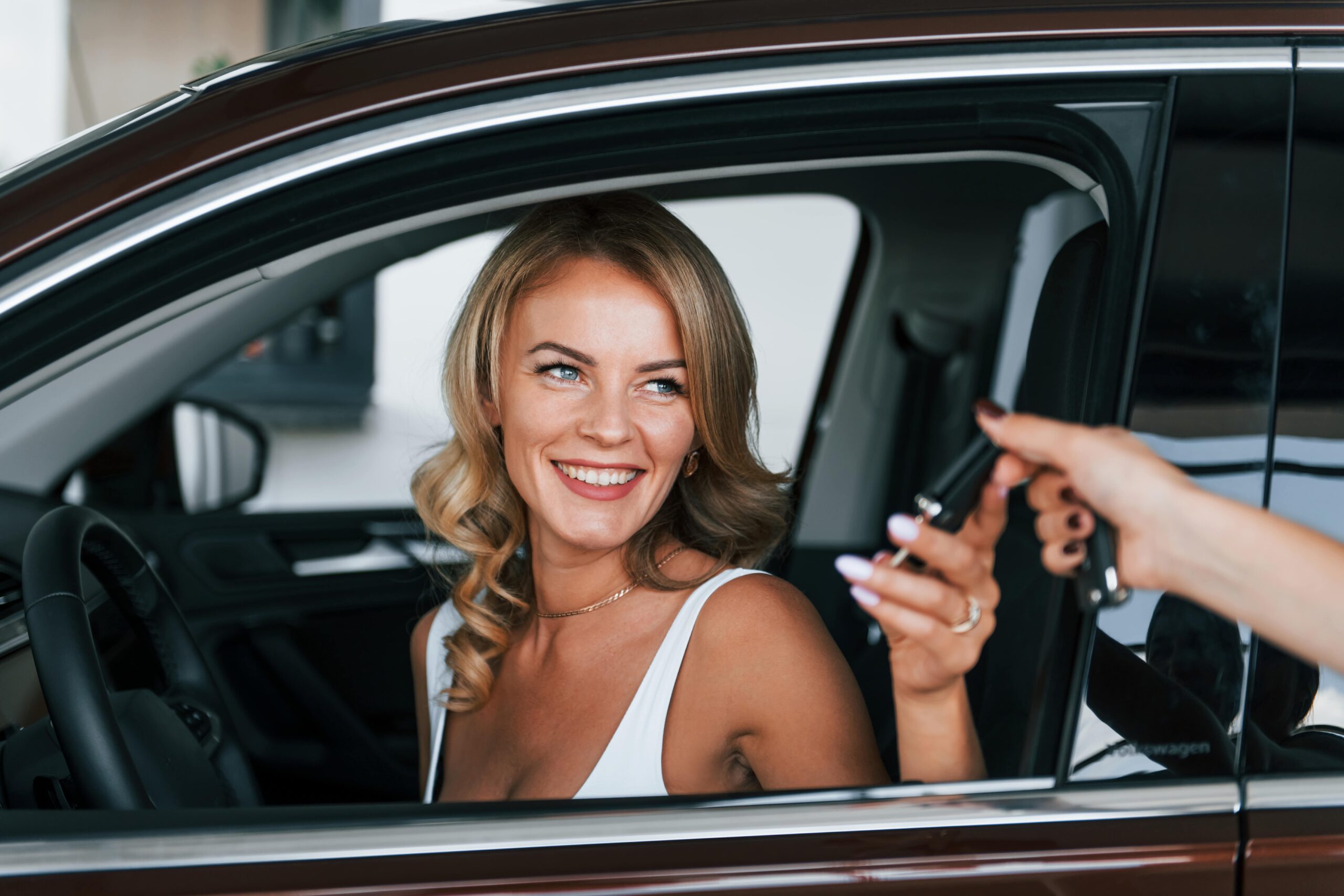 holding-car-keys-woman-in-formal-clothes