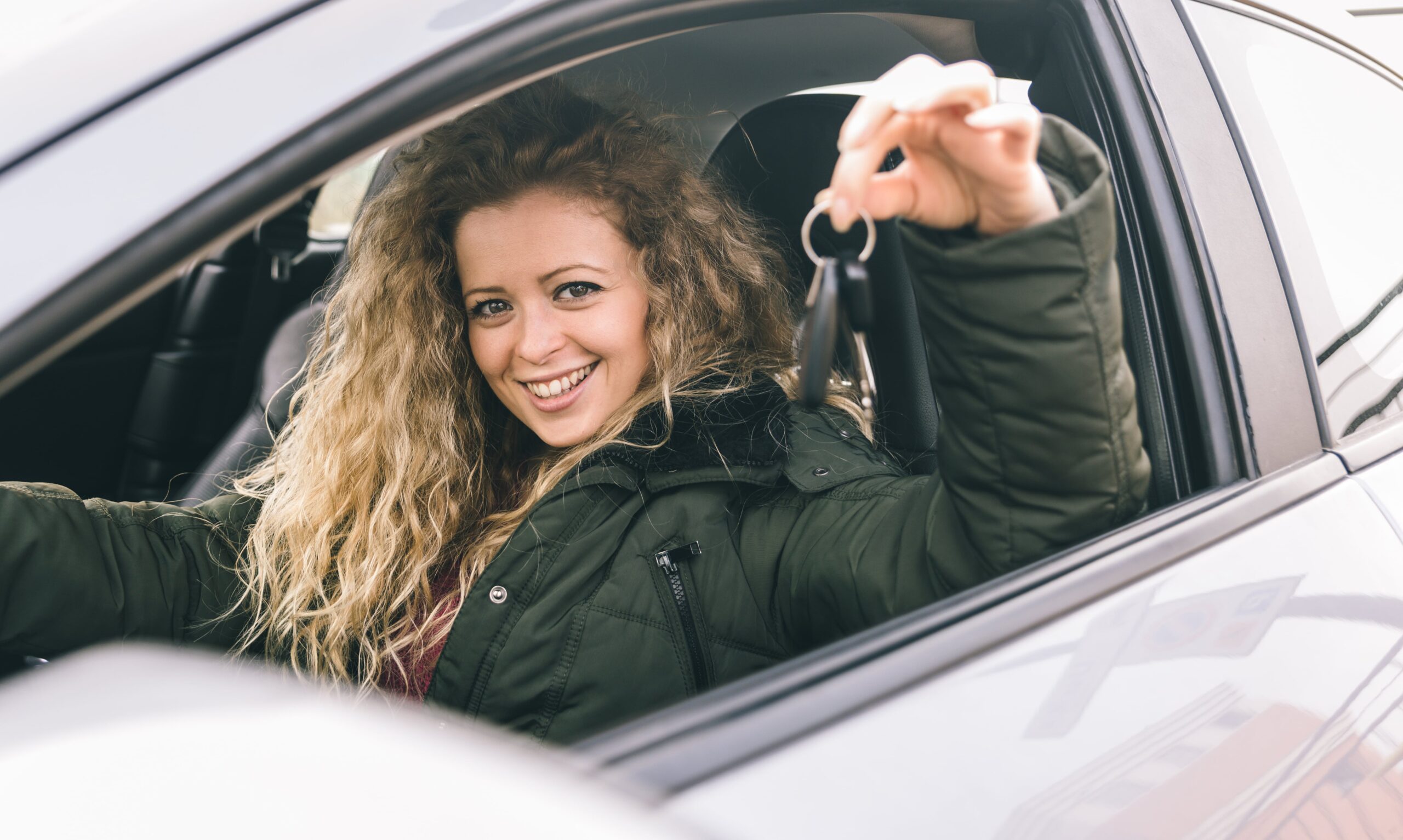 woman-showing-the-car-keys-2022-12-16-22